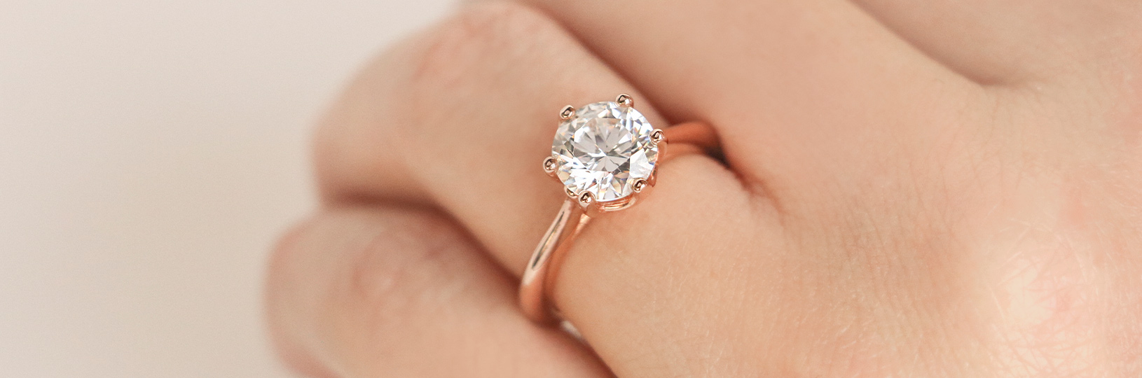 a round cut solitaire ring