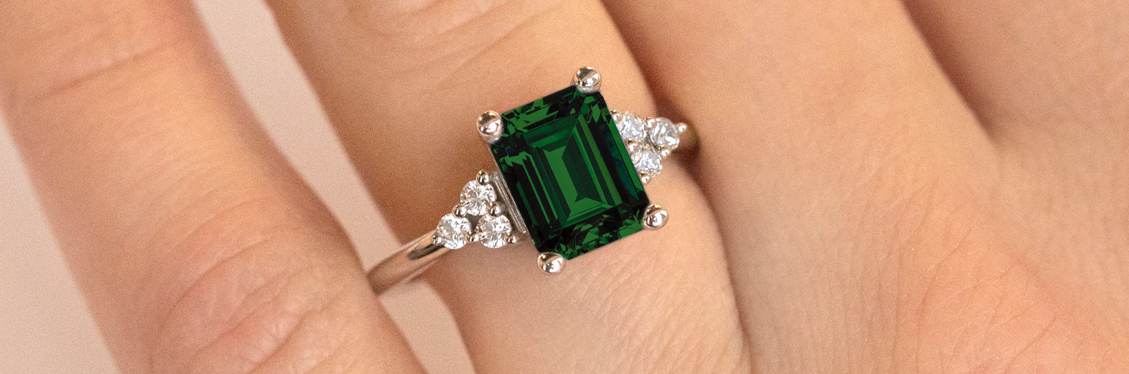 an emerald green diamond ring