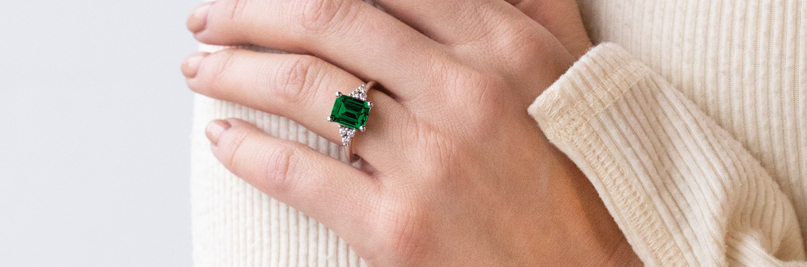 an emerald green diamond ring