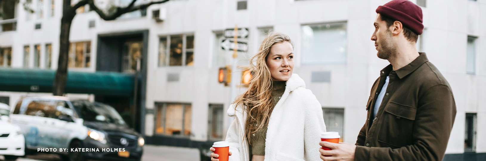 couple drinking coffee outside